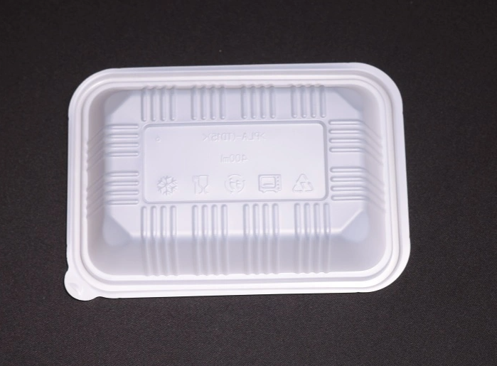 Quali sono le temperature di resistenza al calore e gli scenari applicabili per i contenitori per il pranzo CPLA?